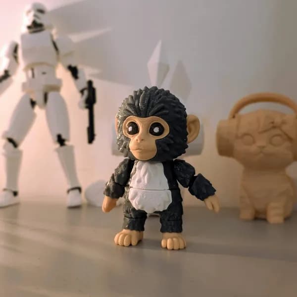 Cute articulated baby chimp figurine