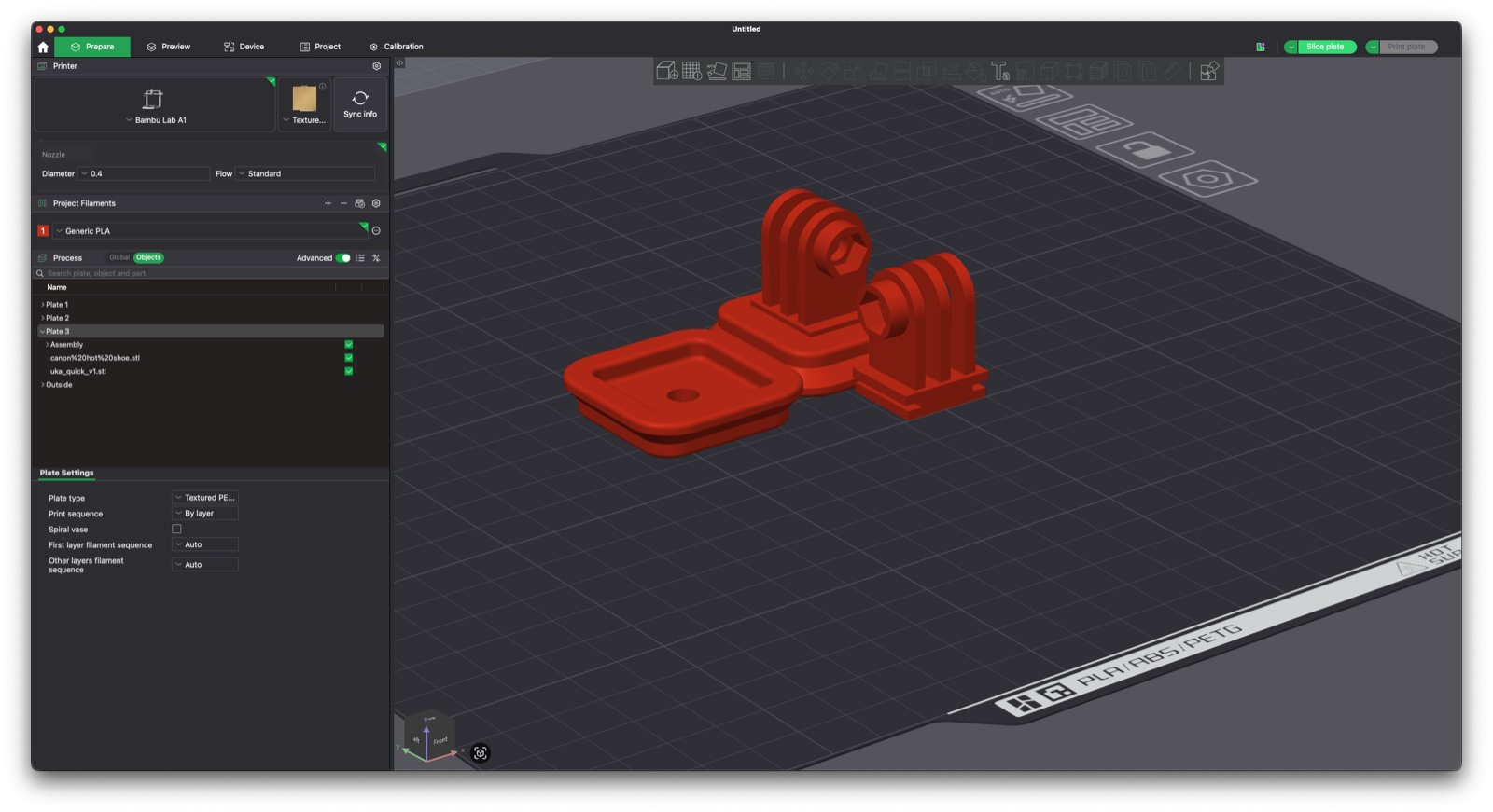 Bambu Studio slicer view with the Ulanzi UKA plate and the hotshoe action-cam mount pieces arranged on a Bambu A1 build plate, printed in red PLA