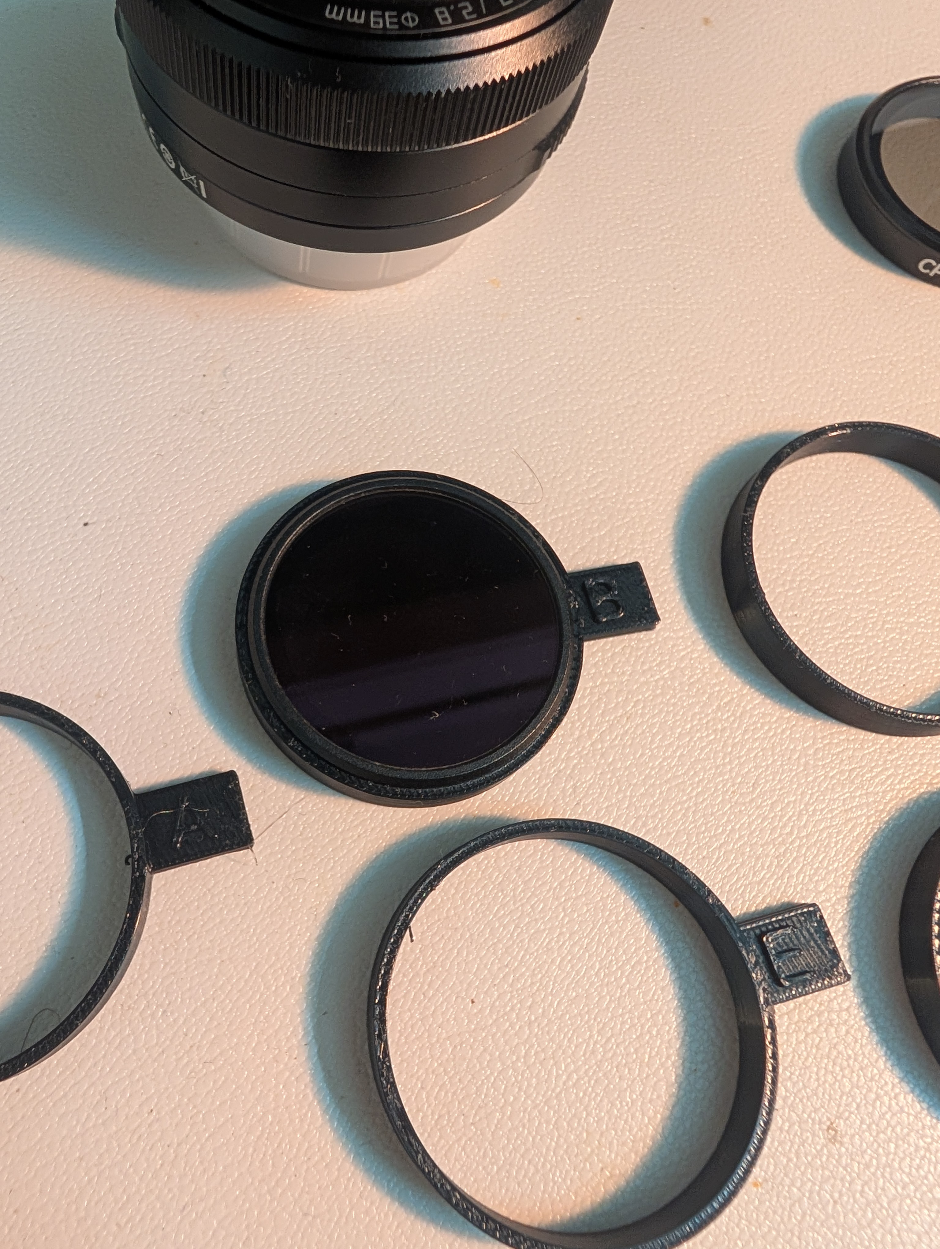 The ND filter dropped into ring B, with rings A, D, and E nearby.