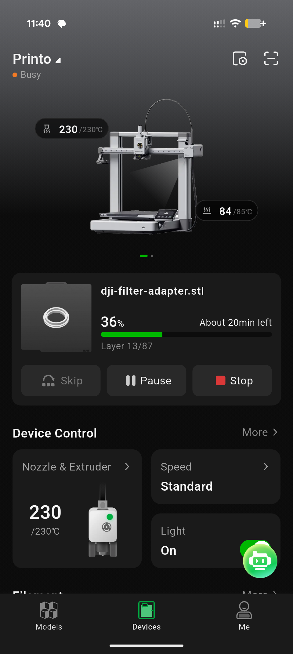Print in progress, monitored from a phone.
